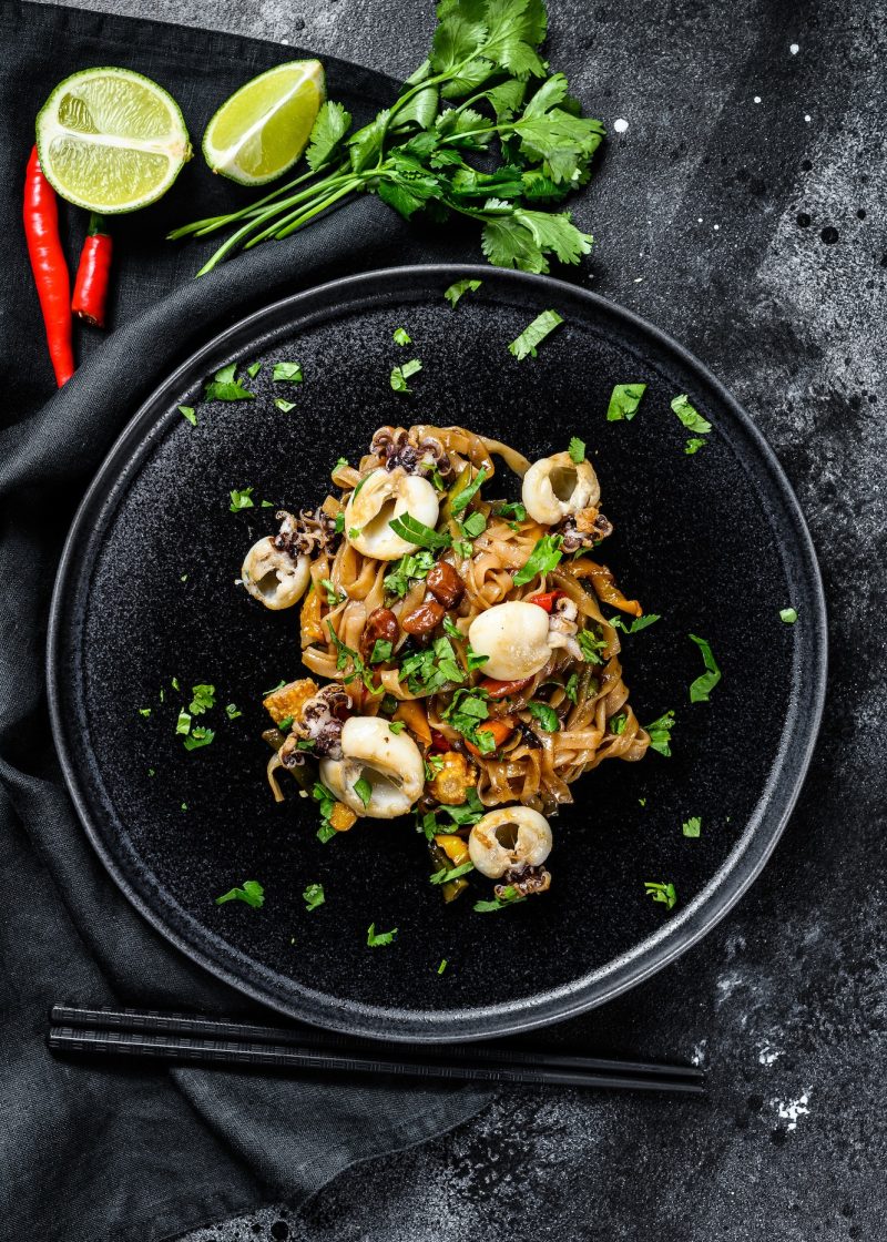 homemade-stir-fry-damage-noodles-with-seafood-and-vegetables-in-a-plate-black-background-top-view.jpg homemade-stir-fry-damage-noodles-with-seafood-and-vegetables-in-a-plate-black-background-top-view.jpg